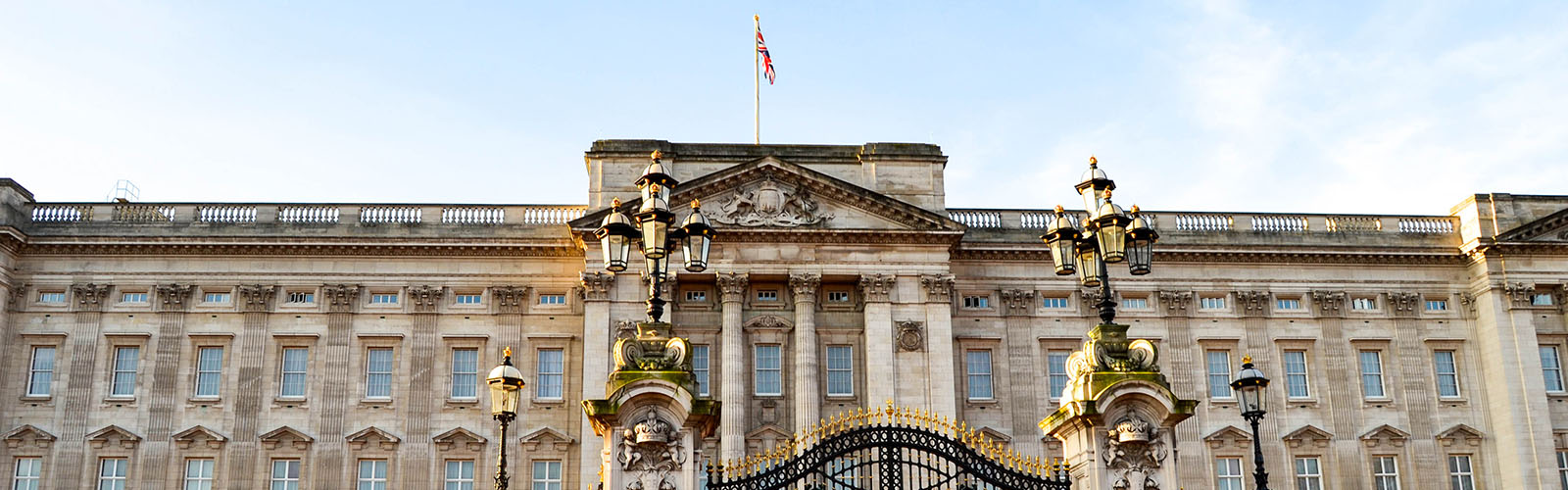 Upper half of Buckingham Palace, showcasing the ornate architecture and iconic detailing of the landmark.